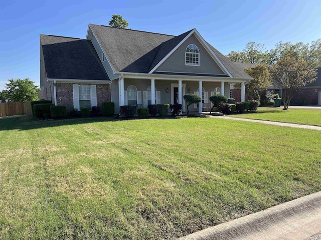 200 Blue Bird Cv, White Hall, AR 71602 - craftsman inspired home featuring roof with shingles, a front yard, a porch, and fence
