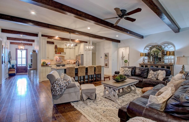 2136 Avondale, Benton, AR 72019 - living room with baseboards, recessed lighting, dark wood-style floors, beam ceiling, and ceiling fan with notable chandelier