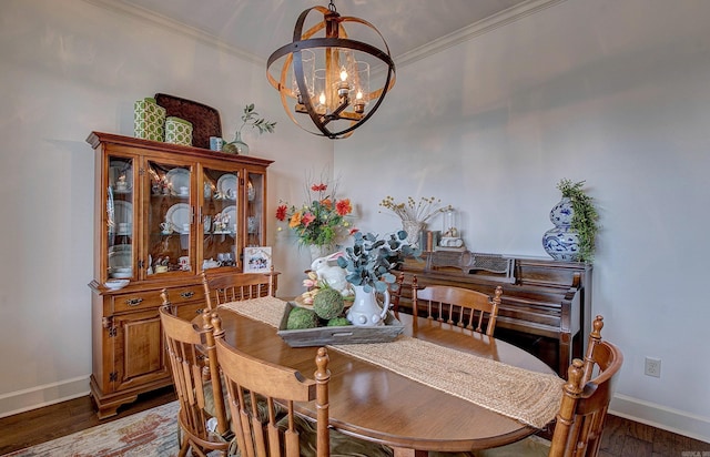2136 Avondale, Benton, AR 72019 - dining area with a chandelier, baseboards, crown molding, and wood finished floors