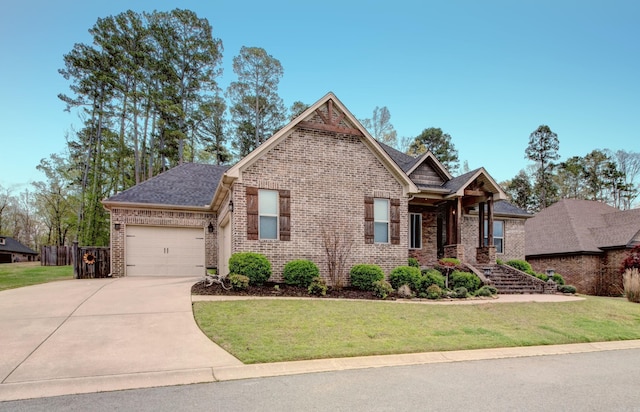 2136 Avondale, Benton, AR 72019 - craftsman house featuring a garage, a front yard, concrete driveway, and brick siding