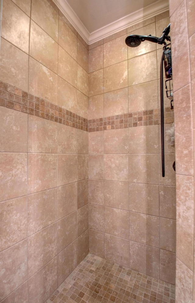 2136 Avondale, Benton, AR 72019 - bathroom featuring ornamental molding and tiled shower