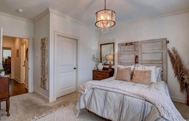 2136 Avondale, Benton, AR 72019 - carpeted bedroom with baseboards, an inviting chandelier, and crown molding