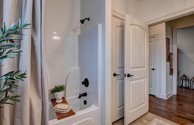 2136 Avondale, Benton, AR 72019 - full bathroom featuring wood finished floors and tub / shower combination