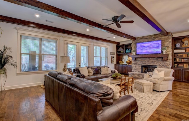 2136 Avondale, Benton, AR 72019 - living area featuring baseboards, a ceiling fan, visible vents, hardwood / wood-style floors, and beam ceiling