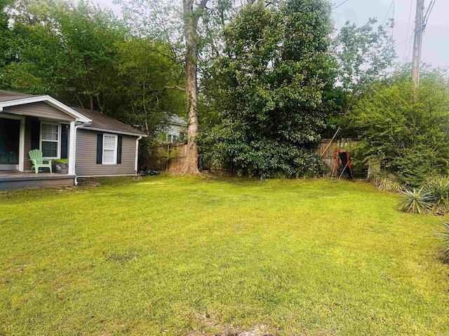 view of yard featuring fence
