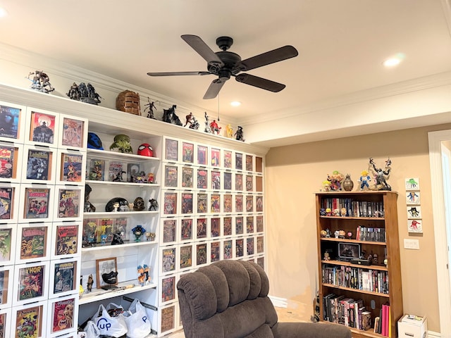 sitting room with ornamental molding, ceiling fan, and recessed lighting