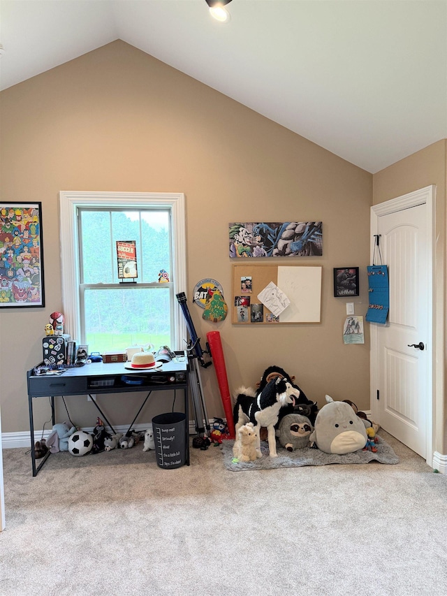 playroom with carpet flooring, baseboards, and vaulted ceiling