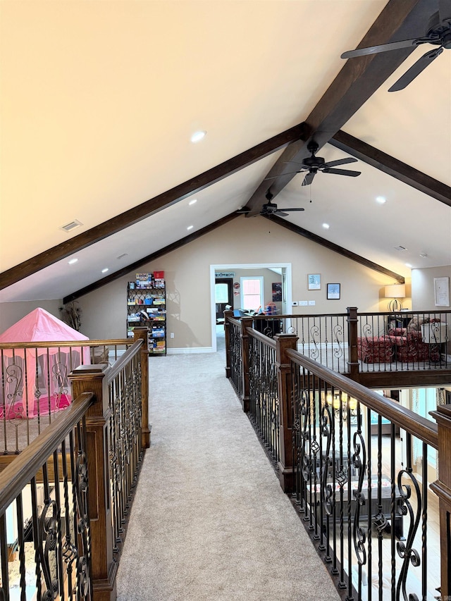 corridor with recessed lighting, carpet, visible vents, and lofted ceiling with beams