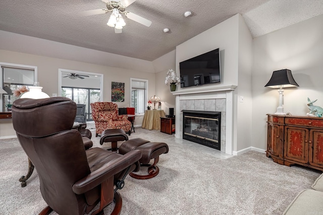 13 Arista Ln, Hot Springs Village, AR 71909 - living area with a tile fireplace, ceiling fan, and carpet floors