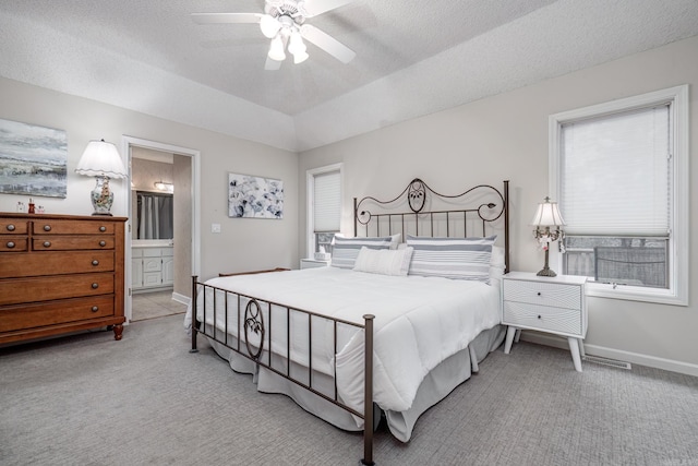 13 Arista Ln, Hot Springs Village, AR 71909 - carpeted bedroom featuring a textured ceiling, ensuite bathroom, baseboards, and a ceiling fan