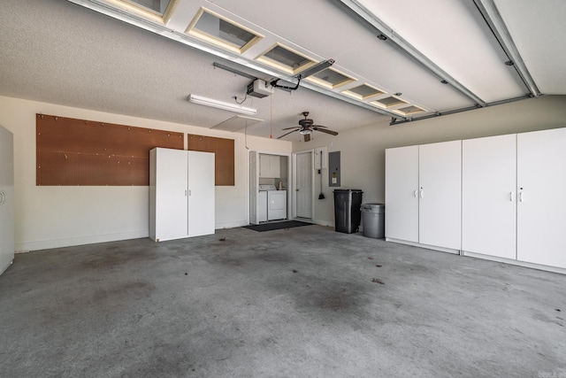 13 Arista Ln, Hot Springs Village, AR 71909 - garage featuring a garage door opener, electric panel, and washer and clothes dryer