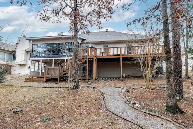 13 Arista Ln, Hot Springs Village, AR 71909 - rear view of property with a sunroom, a deck, and stairway