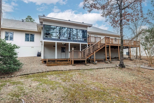 13 Arista Ln, Hot Springs Village, AR 71909 - back of property featuring a sunroom, a wooden deck, and stairway