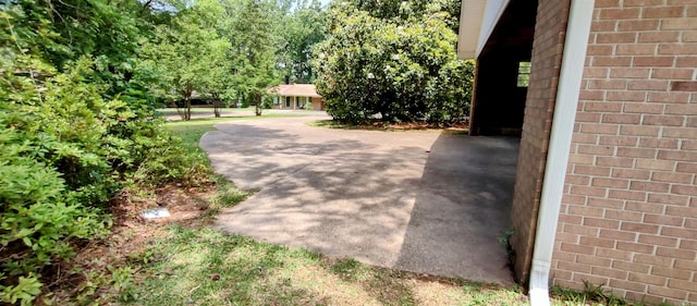 1019 Amanda St, Camden, AR 71701 - view of side of home featuring brick siding