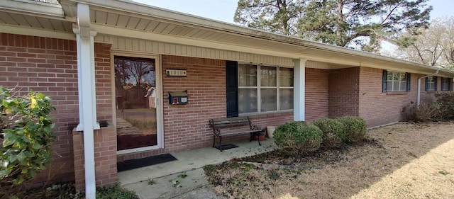 1019 Amanda St, Camden, AR 71701 - entrance to property featuring brick siding and covered porch