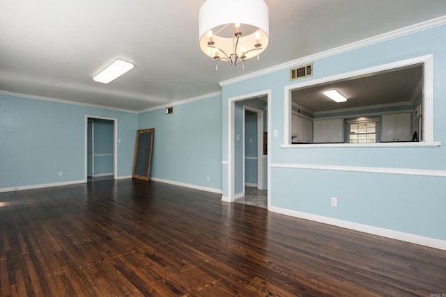 124 Hiawatha Dr, Little Rock, AR 72211 - spare room featuring ornamental molding, visible vents, wood finished floors, baseboards, and a notable chandelier