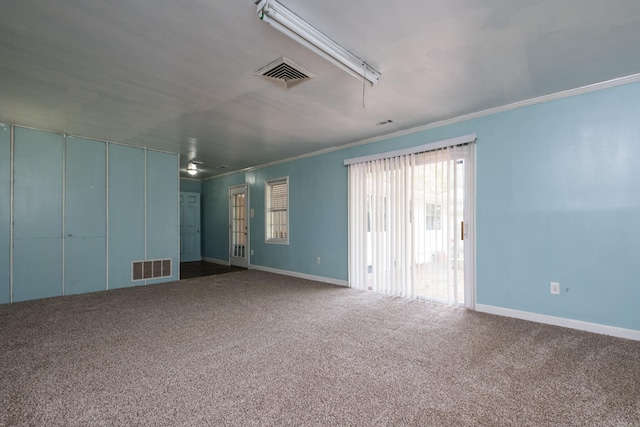 124 Hiawatha Dr, Little Rock, AR 72211 - carpeted empty room with crown molding, visible vents, and baseboards