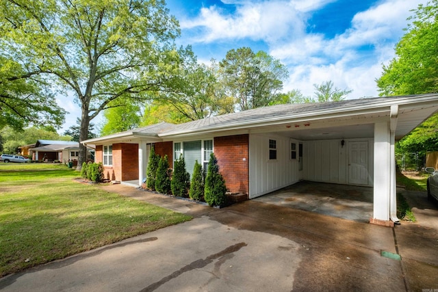 124 Hiawatha Dr, Little Rock, AR 72211 - single story home with concrete driveway, a front yard, roof with shingles, and an attached carport