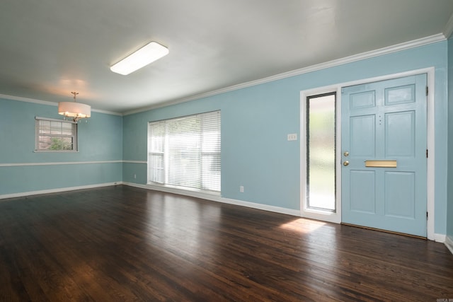 124 Hiawatha Dr, Little Rock, AR 72211 - empty room featuring a chandelier, crown molding, dark wood-style flooring, and baseboards