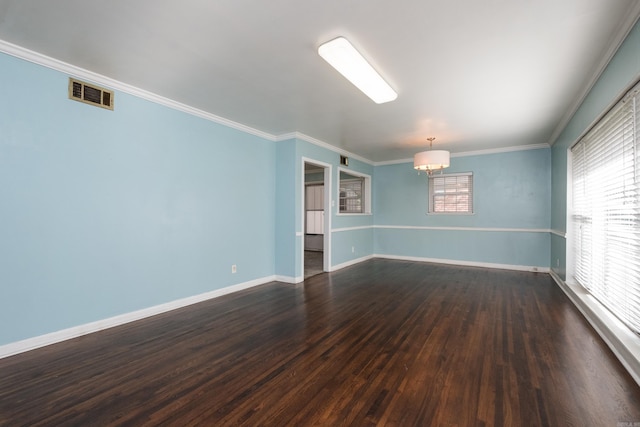 124 Hiawatha Dr, Little Rock, AR 72211 - spare room featuring dark wood-type flooring, visible vents, baseboards, and ornamental molding