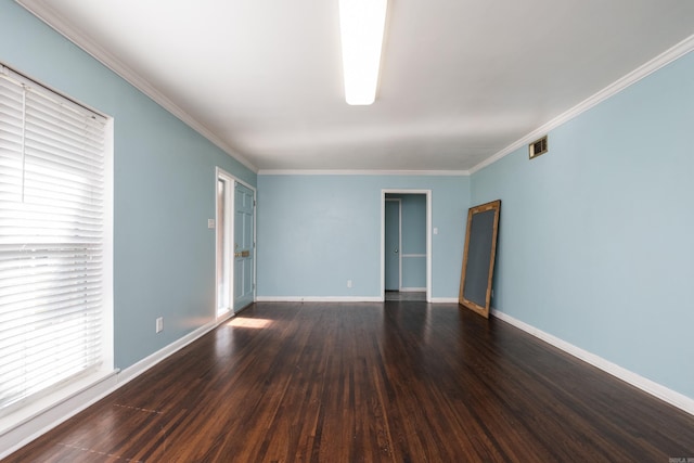 124 Hiawatha Dr, Little Rock, AR 72211 - spare room with visible vents, baseboards, ornamental molding, and wood finished floors