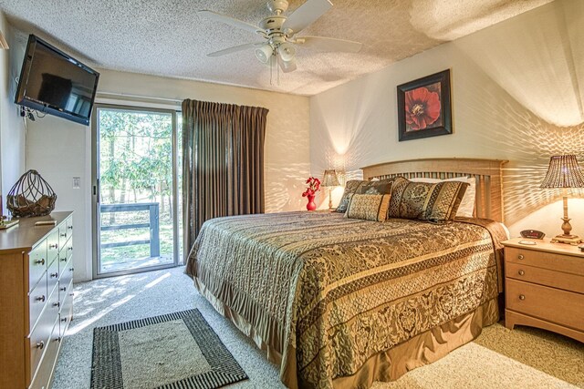 20 Cortez Way, Hot Springs Village, AR 71909 - carpeted bedroom featuring a textured ceiling, access to exterior, and a ceiling fan