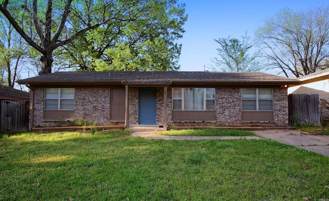 28 Wellford Dr, Little Rock, AR 72209 - ranch-style house featuring a front yard, brick siding, and fence