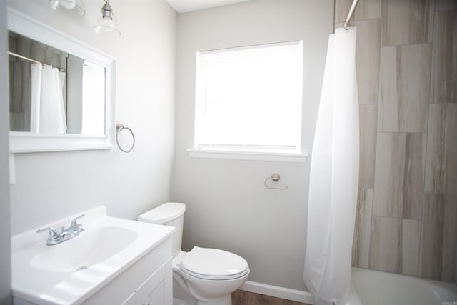7204 W Wakefield Dr, Little Rock, AR 72209 - bathroom featuring toilet, vanity, and shower / bath combination with curtain