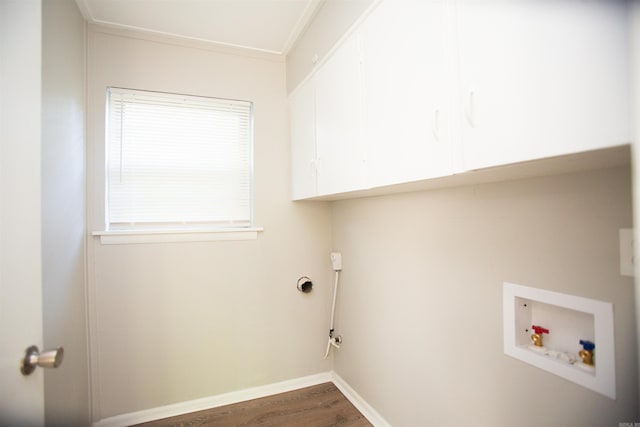 7204 W Wakefield Dr, Little Rock, AR 72209 - washroom featuring baseboards, ornamental molding, dark wood-type flooring, hookup for a washing machine, and cabinet space