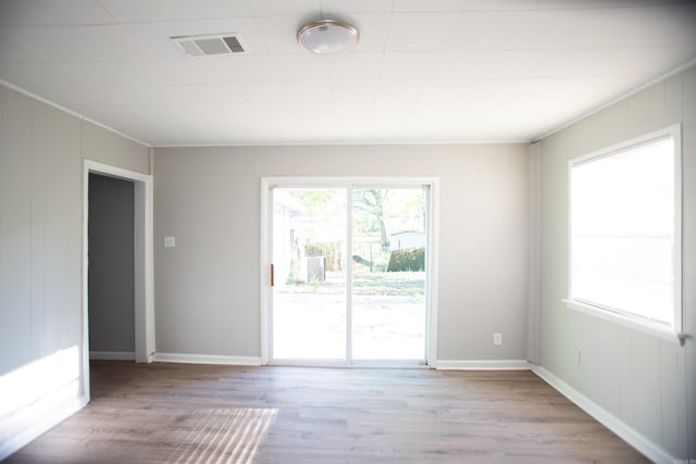 7204 W Wakefield Dr, Little Rock, AR 72209 - spare room with visible vents, baseboards, and wood finished floors