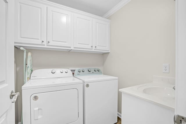 2540 Gladiola, Conway, AR 72034 - clothes washing area featuring independent washer and dryer, crown molding, and cabinet space