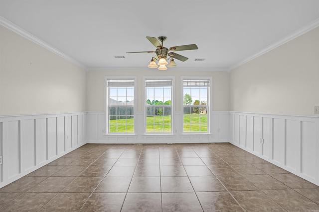 2540 Gladiola, Conway, AR 72034 - tiled spare room featuring visible vents, a ceiling fan, ornamental molding, and wainscoting