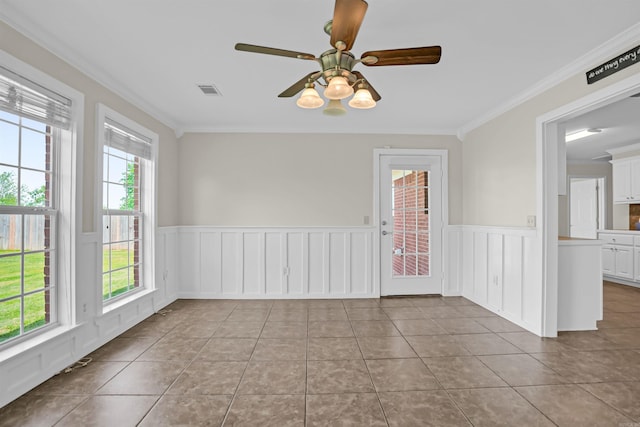 2540 Gladiola, Conway, AR 72034 - unfurnished room featuring a ceiling fan, wainscoting, and ornamental molding