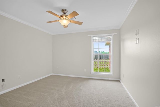 2540 Gladiola, Conway, AR 72034 - empty room featuring crown molding, carpet floors, baseboards, and a ceiling fan