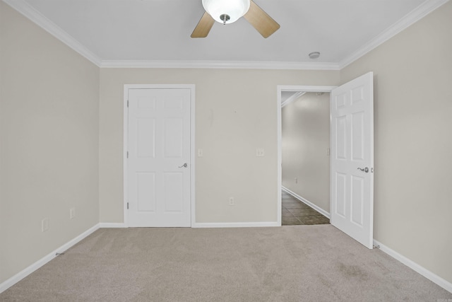 2540 Gladiola, Conway, AR 72034 - unfurnished bedroom featuring a ceiling fan, carpet flooring, baseboards, and ornamental molding