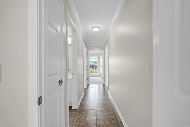 2540 Gladiola, Conway, AR 72034 - corridor featuring ornamental molding, baseboards, and dark tile patterned floors