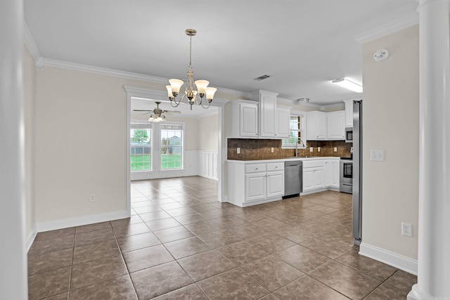 2540 Gladiola, Conway, AR 72034 - kitchen featuring a healthy amount of sunlight, a sink, ornamental molding, and stainless steel appliances