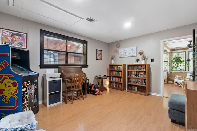 16 Valley Rd, Cabot, AR 72023 - game room with wood finished floors, baseboards, and visible vents