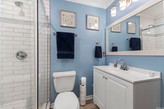 16 Valley Rd, Cabot, AR 72023 - bathroom with ornamental molding, toilet, a shower stall, vanity, and wood finished floors