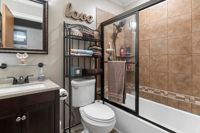 16 Valley Rd, Cabot, AR 72023 - full bathroom with ornamental molding, toilet, vanity, and bath / shower combo with glass door