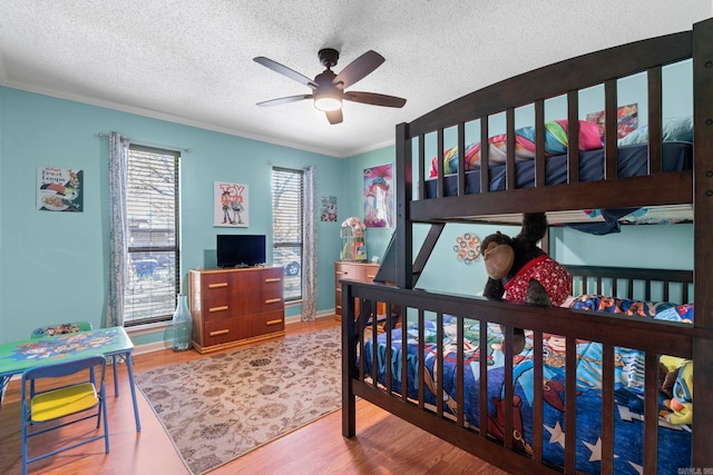 16 Valley Rd, Cabot, AR 72023 - bedroom with a textured ceiling, wood finished floors, and ornamental molding