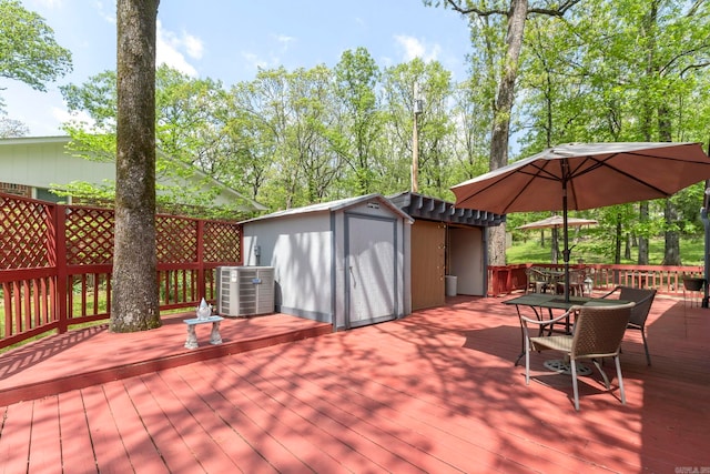 16 Valley Rd, Cabot, AR 72023 - wooden terrace with an outbuilding, a storage shed, and cooling unit