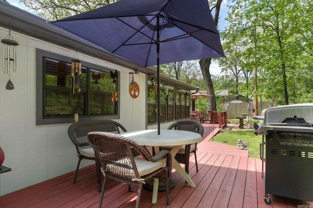 16 Valley Rd, Cabot, AR 72023 - wooden terrace with a grill, outdoor dining space, and fence