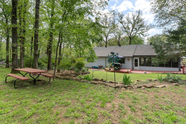 16 Valley Rd, Cabot, AR 72023 - rear view of house with cooling unit, a yard, a wooden deck, and a sunroom
