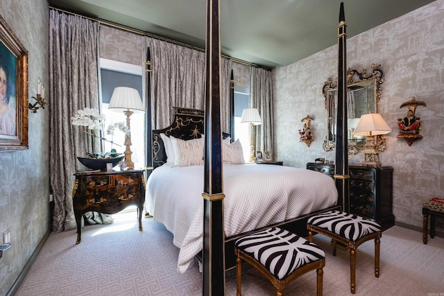 bedroom with baseboards, carpet flooring, and wallpapered walls