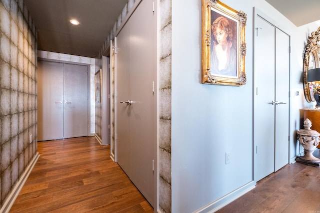 corridor featuring recessed lighting and wood finished floors