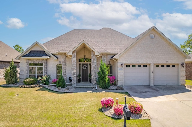 ranch-style house featuring a front yard, brick siding, a garage, and concrete driveway