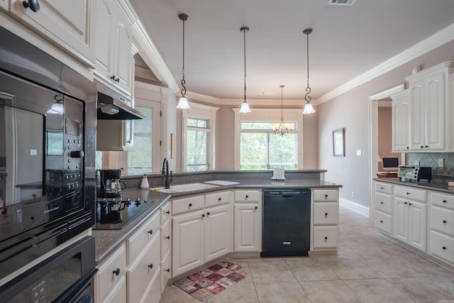 kitchen with a chandelier, light tile patterned floors, white cabinetry, backsplash, and black appliances