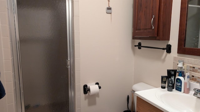 1012 Fairwater Cir, Horseshoe Bend, AR 72512 - full bath with decorative backsplash, a stall shower, vanity, and toilet