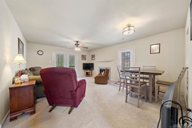 1100 Woodlawn Ave Unit K-61, Hot Springs, AR 71913 - living room with baseboards, a ceiling fan, plenty of natural light, and light carpet